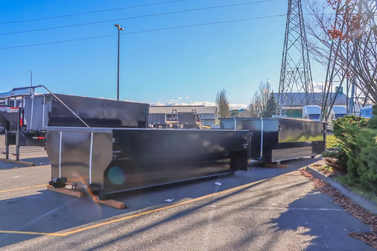 Roll-off dumpster ready for waste disposal at job site for Yard Waste Dumpster Rental in Pleasant View